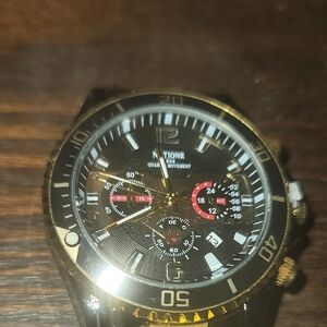 Gold and Black Watch with Red Details